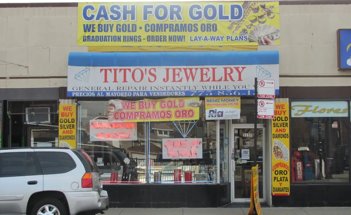 The Tito's Jewelry storefront at 5157 W Diversey Ave, with its blue and white awning